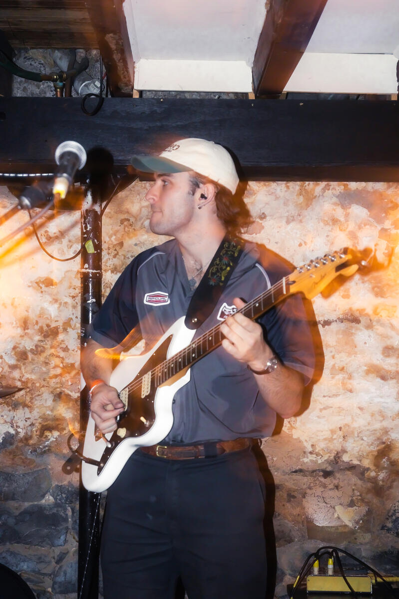 Untitled Flash image of a man playing guitar