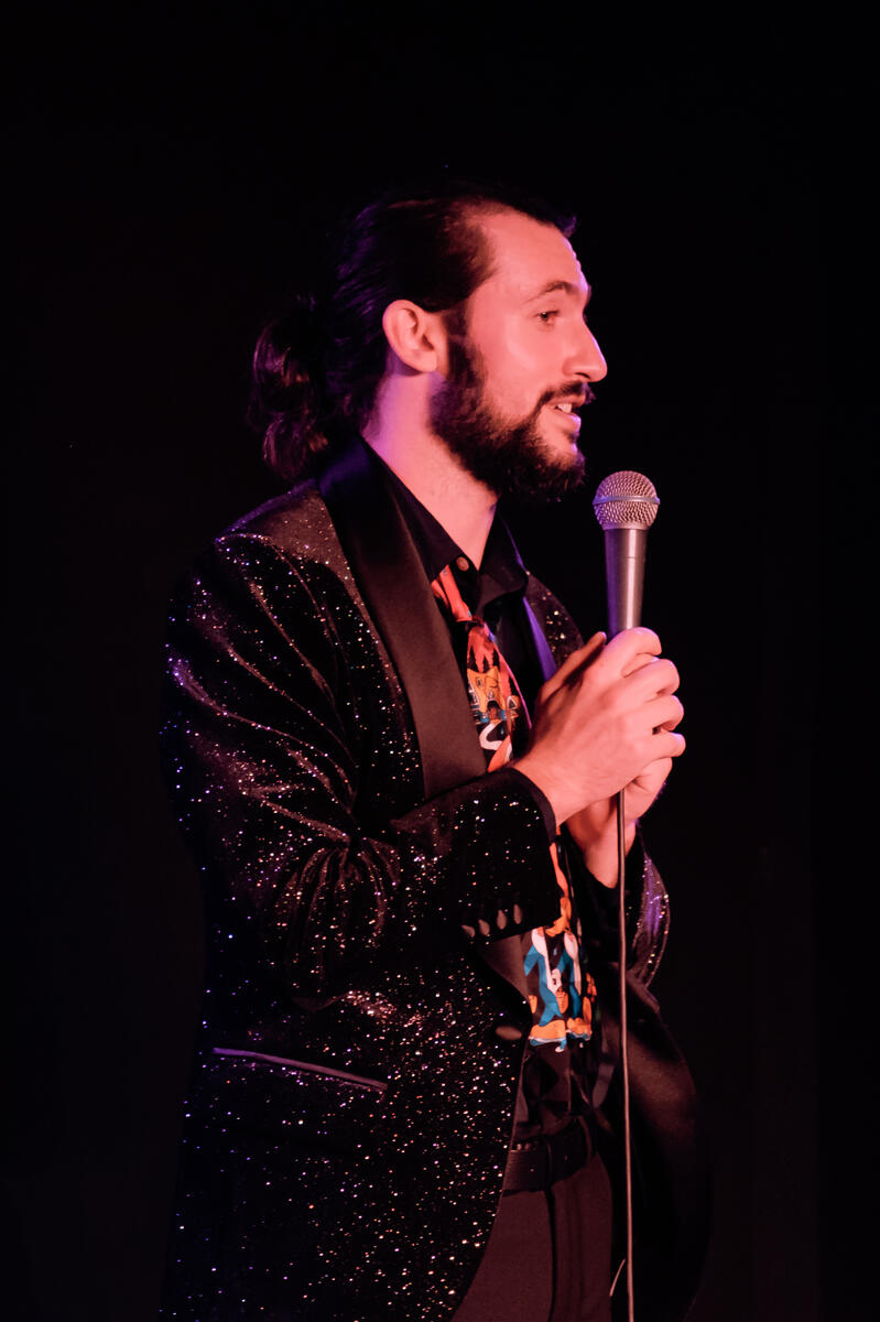 Untitled Man performing at comedy show